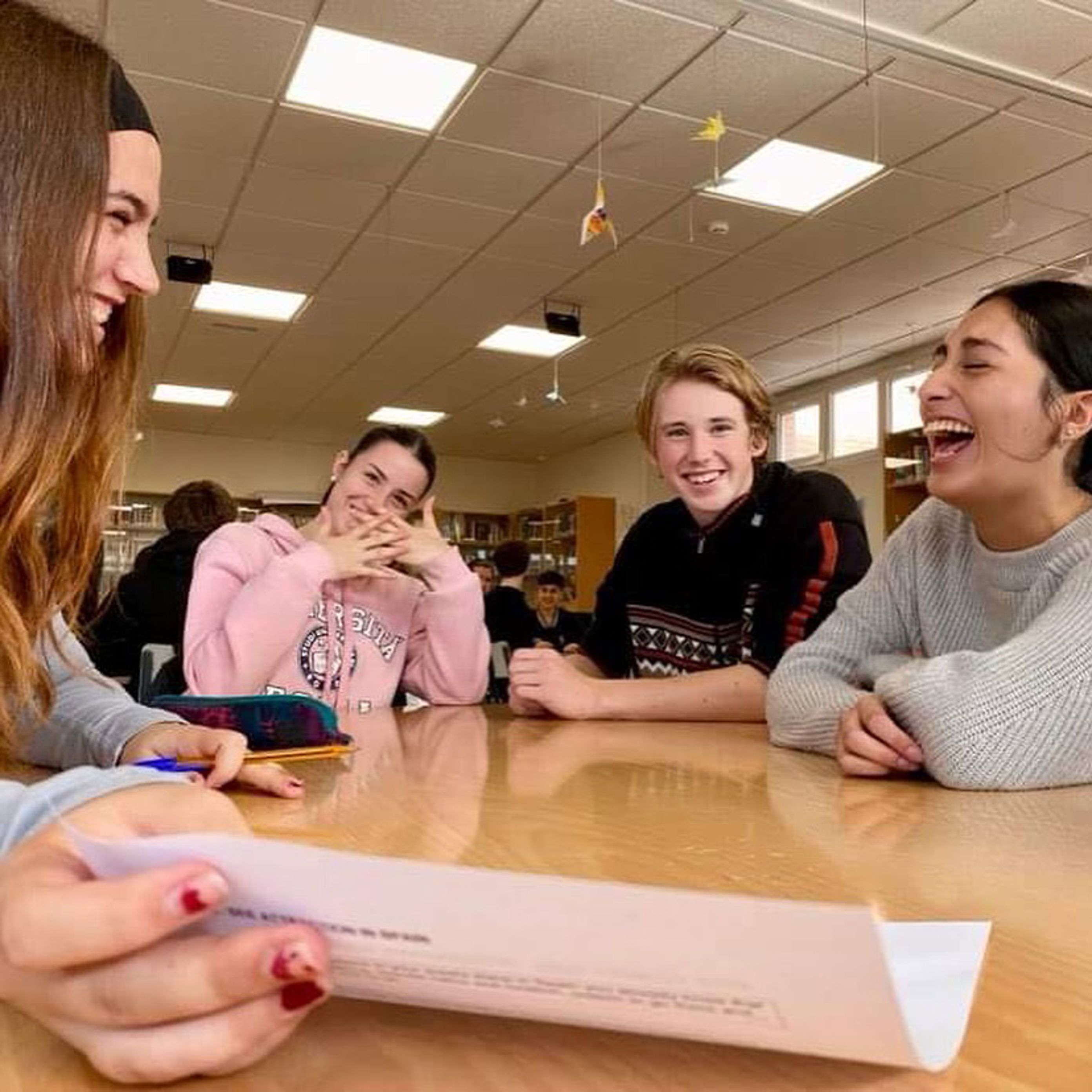 Foto: Trude Bjerga en gruppe mennesker som sitter ved et bord